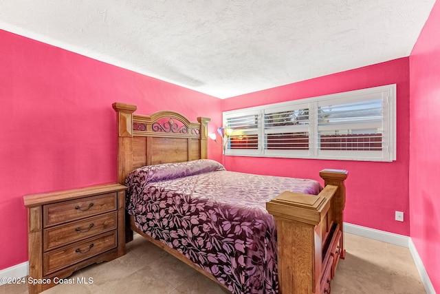 bedroom with a textured ceiling