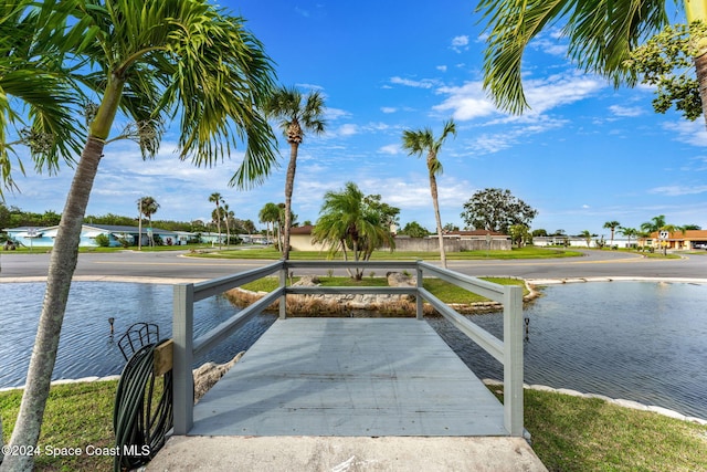 dock area featuring a water view