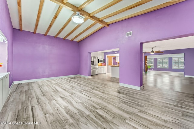 unfurnished living room with beam ceiling, ceiling fan, high vaulted ceiling, and light hardwood / wood-style floors