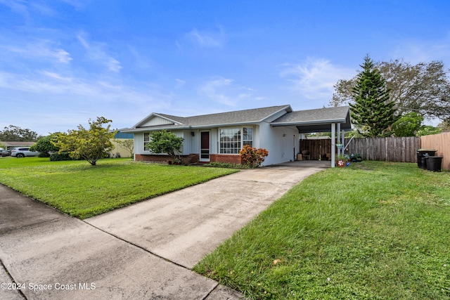 single story home featuring a front yard and a carport