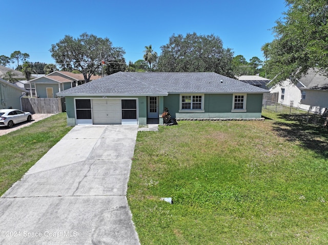 single story home with a front lawn and a garage