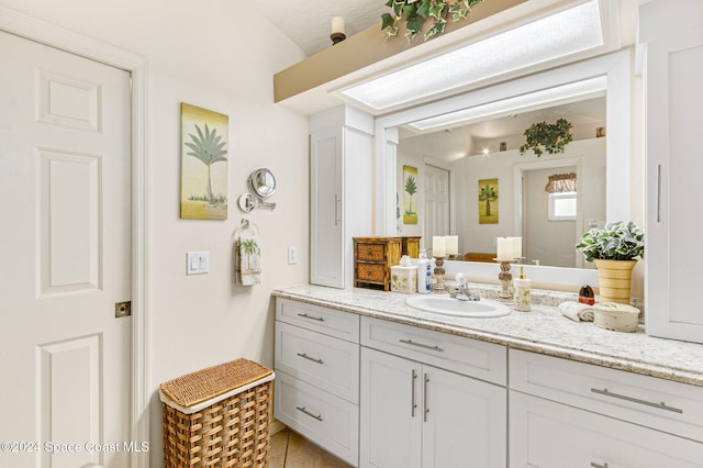 bathroom featuring vanity and tile patterned floors