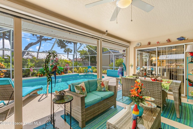 sunroom / solarium with ceiling fan