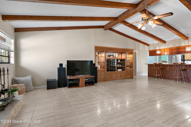 tiled living room with high vaulted ceiling, bar, beamed ceiling, and ceiling fan