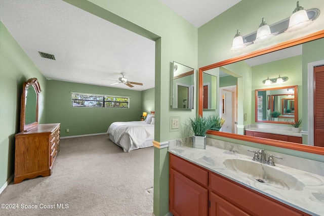 bathroom featuring vanity and ceiling fan