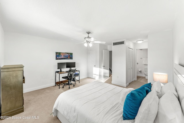 carpeted bedroom featuring ceiling fan, connected bathroom, and a closet