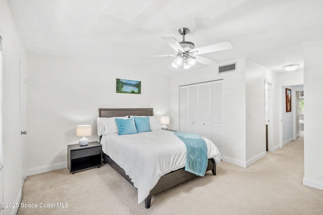 170 Paradise Blvd Unit 17013, Melbourne, FL 32903 - carpeted bedroom with a closet and a ceiling fan