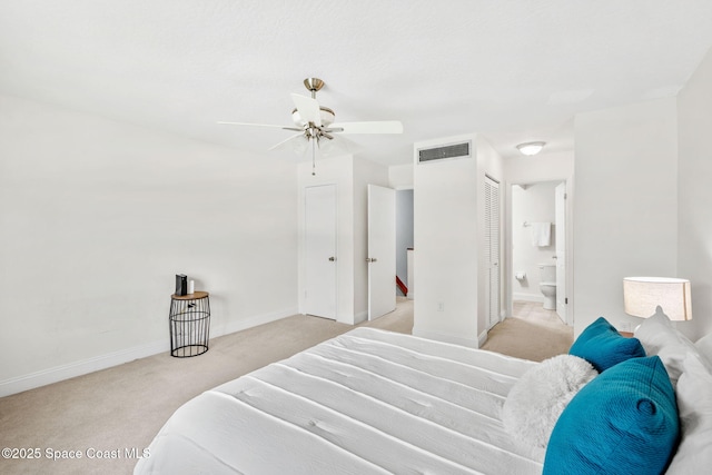 170 Paradise Blvd Unit 17013, Melbourne, FL 32903 - bedroom featuring carpet flooring, ensuite bath, and a ceiling fan
