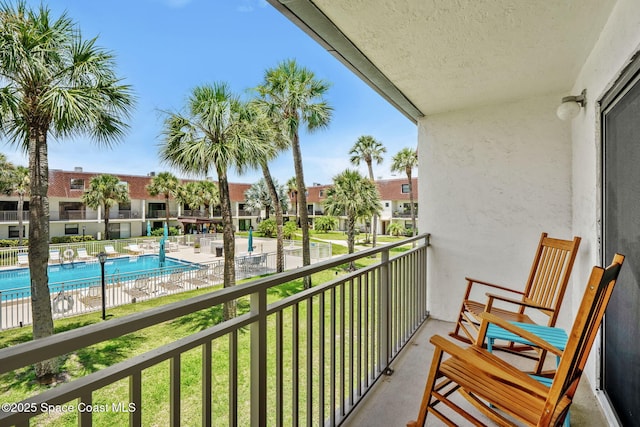 170 Paradise Blvd Unit 17013, Melbourne, FL 32903 - balcony with view of pool area and a residential view