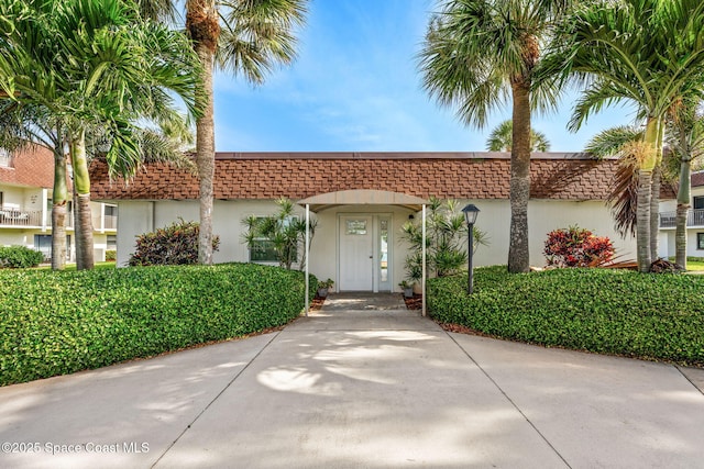 170 Paradise Blvd Unit 17013, Melbourne, FL 32903 - view of exterior entry featuring stucco siding