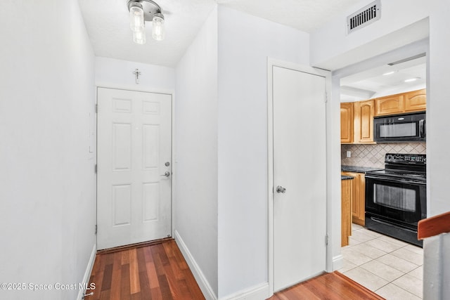170 Paradise Blvd Unit 17013, Melbourne, FL 32903 - hall with light wood-style floors