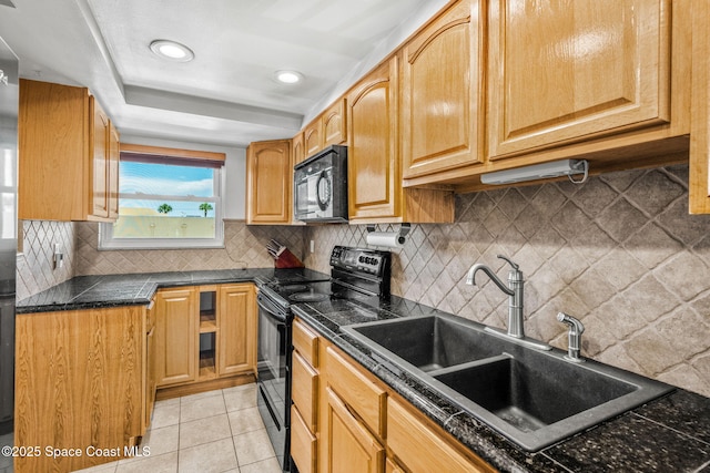 170 Paradise Blvd Unit 17013, Melbourne, FL 32903 - kitchen featuring black appliances, backsplash, light tile patterned floors, and recessed lighting