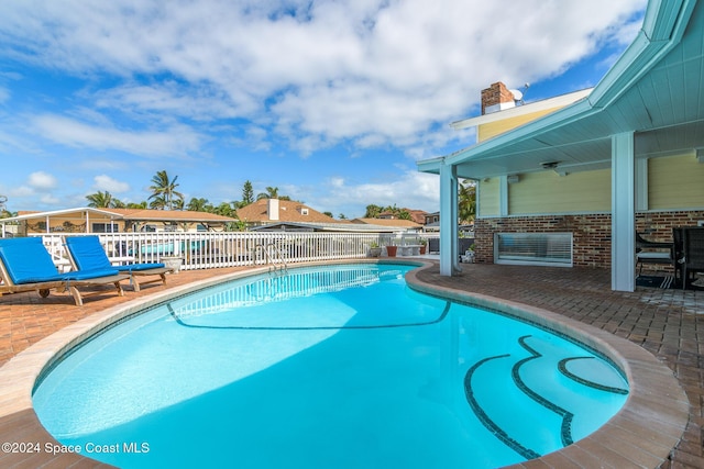 1730 E Central Ave, Merritt Island, FL 32952 - view of swimming pool featuring a patio area