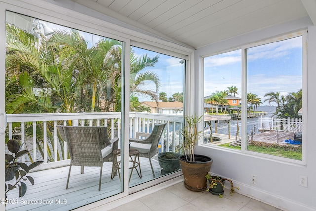 1730 E Central Ave, Merritt Island, FL 32952 - sunroom / solarium featuring lofted ceiling, plenty of natural light, and a water view