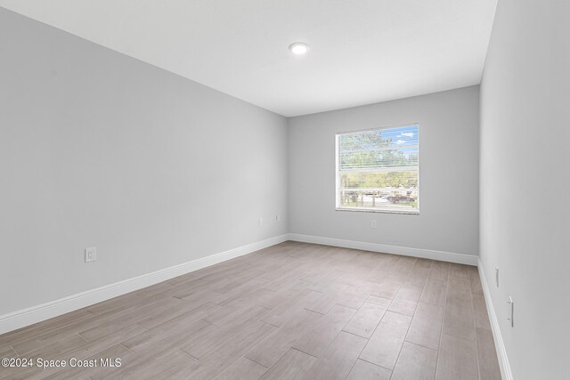 empty room with light wood-type flooring