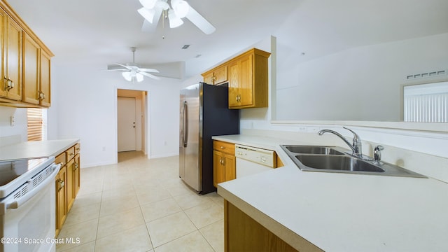 kitchen with lofted ceiling, sink, light tile patterned floors, ceiling fan, and white appliances