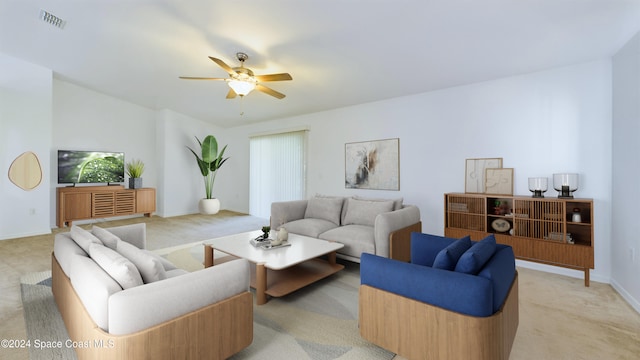 carpeted living room with ceiling fan