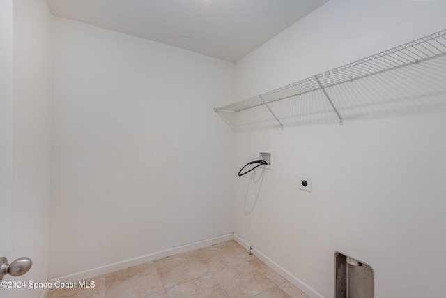 laundry room with washer hookup and hookup for an electric dryer