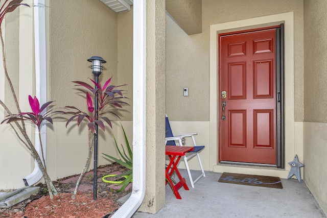 2650 Revolution St Unit 104, Melbourne, FL 32935 - entrance to property featuring stucco siding