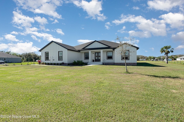 view of front of house with a front lawn