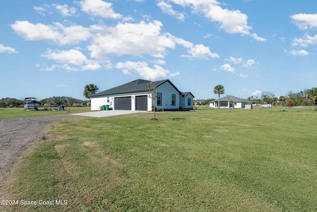 view of yard featuring a garage