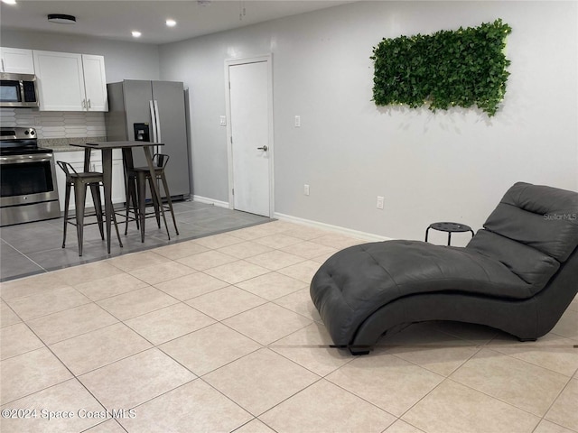 interior space with light tile patterned floors