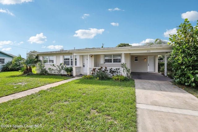 single story home with a carport and a front yard