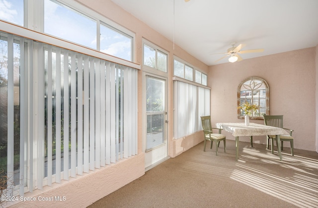 sunroom / solarium with ceiling fan