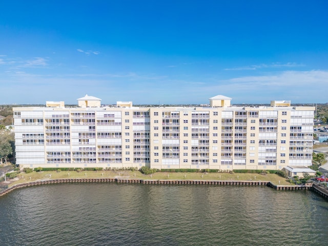 view of property with a water view