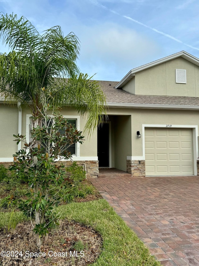 view of front of house with a garage