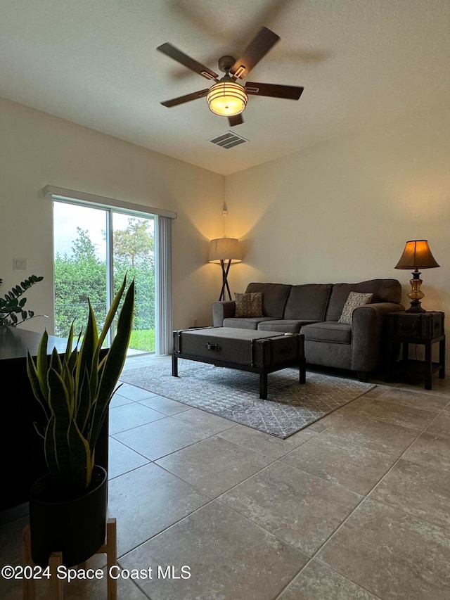 living room featuring ceiling fan