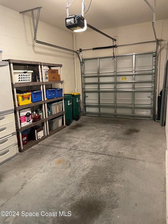 garage featuring a garage door opener