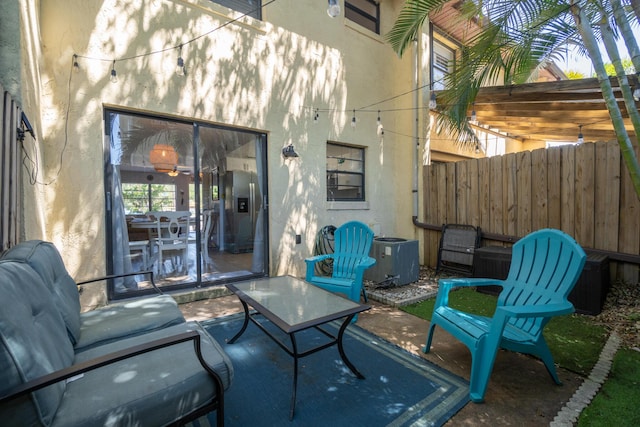 view of patio with central AC