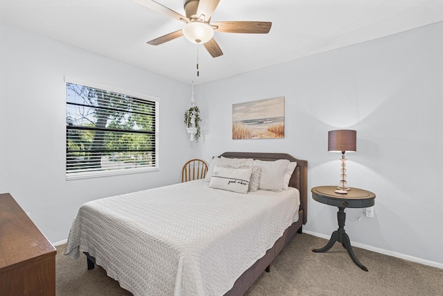 bedroom with ceiling fan and carpet floors