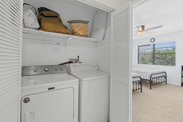 washroom featuring ceiling fan, light colored carpet, and separate washer and dryer