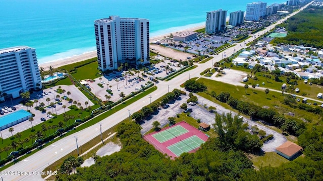 bird's eye view with a beach view and a water view