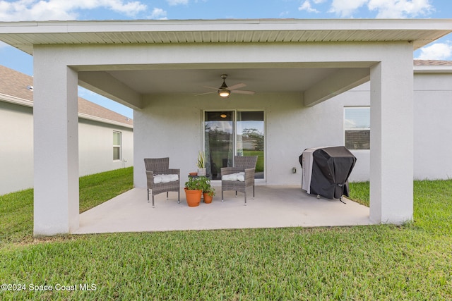 view of patio / terrace featuring grilling area and ceiling fan