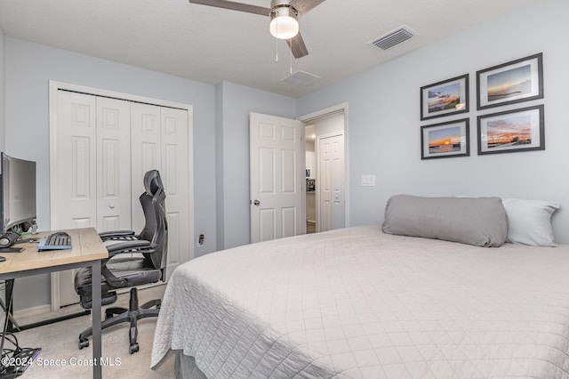 bedroom with light carpet, a closet, and ceiling fan