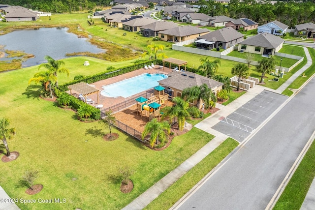 drone / aerial view with a water view