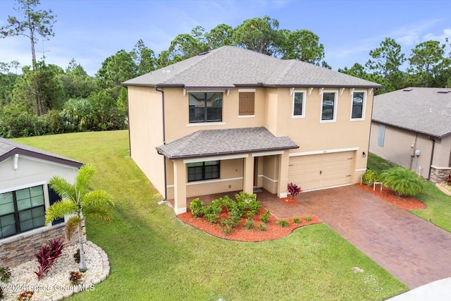 view of front facade featuring a front lawn and a garage