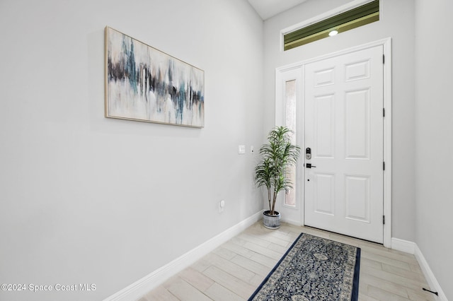 entrance foyer with light hardwood / wood-style flooring