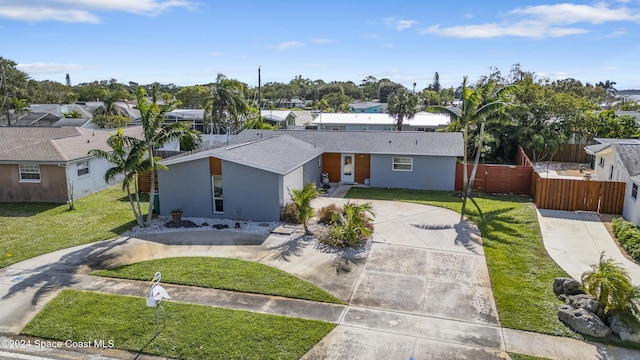 view of front of property with a front lawn