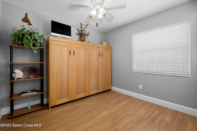 bedroom featuring ceiling fan and light hardwood / wood-style flooring