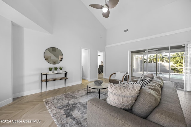 living room featuring high vaulted ceiling, light parquet floors, and ceiling fan