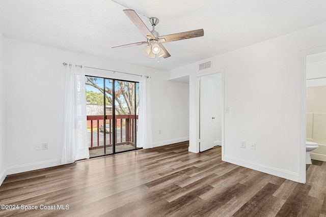 unfurnished room with wood-type flooring and ceiling fan