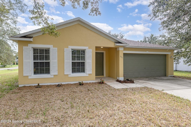 ranch-style house with a garage