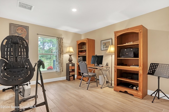 office space featuring light hardwood / wood-style floors