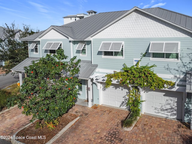 view of front of property featuring a garage