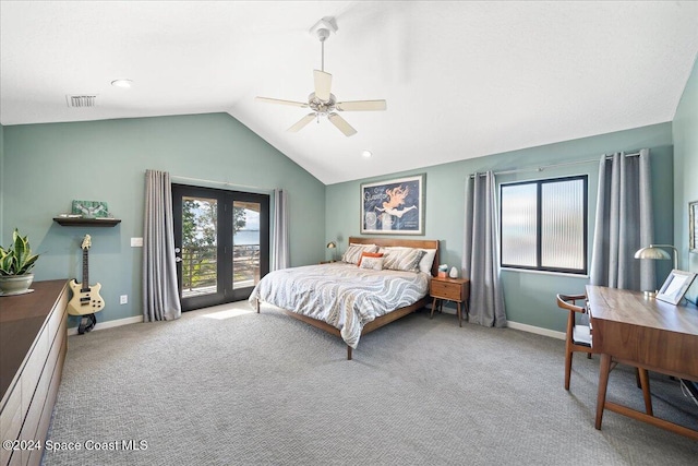 carpeted bedroom featuring ceiling fan and vaulted ceiling