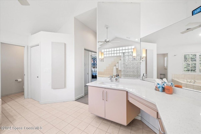 bathroom featuring a bathing tub, ceiling fan, tile patterned flooring, high vaulted ceiling, and vanity